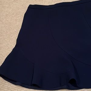 Navy blue women’s flutter skirt size 4